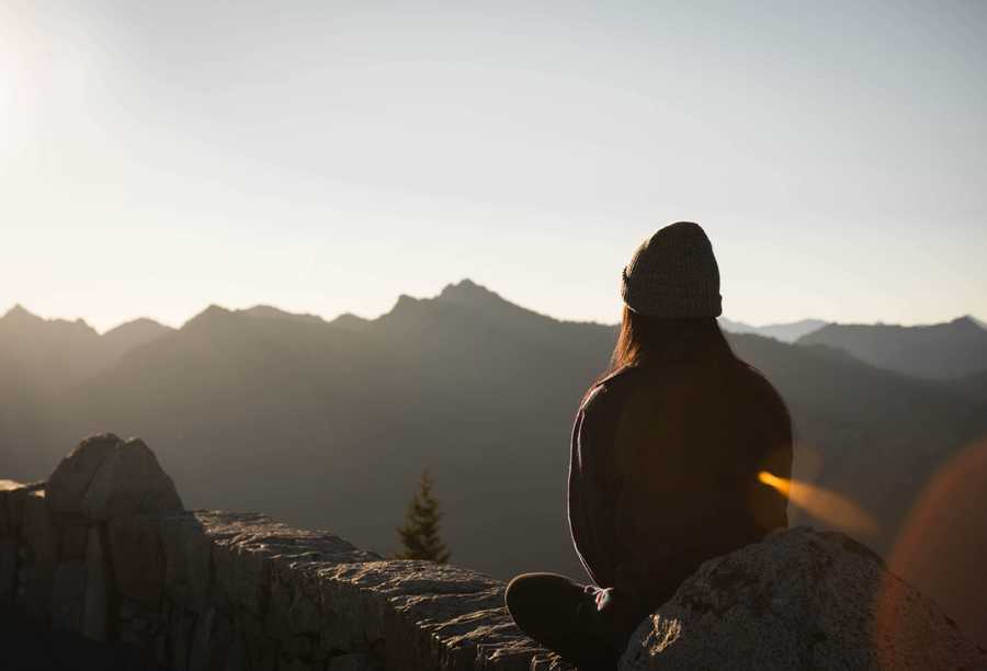 Women meditating outdoors