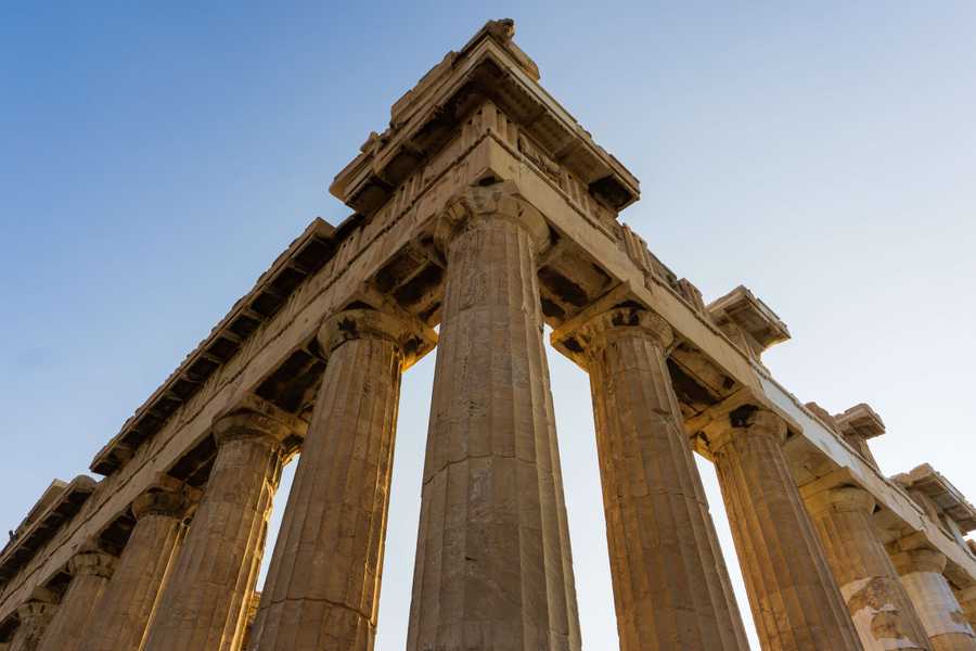 Upward view of ancient pillars of the parthenon