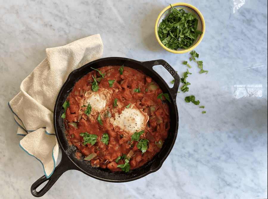 Homemade Shakshuka being cooked on the stovetop