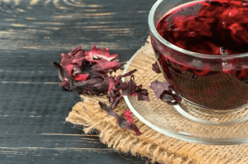 Cup of hibiscus with dried leaves