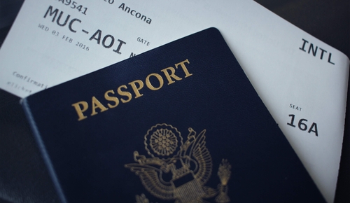 US Passport and plane ticket