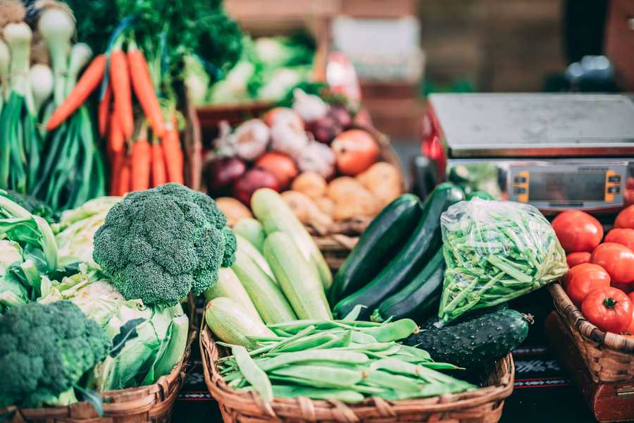 Fresh vegetables in wicker baskets